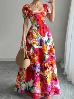 Robe de vacances maxi fleurie à col carré et manches bouffantes taille haute et volantée