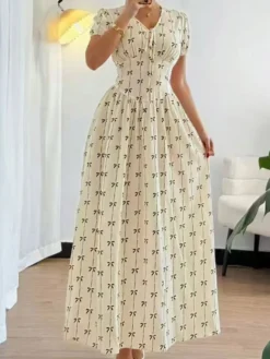 Robe de vacances maxi fleurie à col V et manches bouffantes taille haute coupe trapèze longue robe fluide
