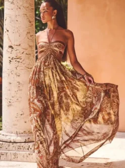 Robe de vacances maxi fluide à imprimé cachemire dos nu et bustier taille découpée style jacquard.