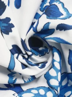 Robe de vacances mini dos nu découpée à lacets sans manches imprimé floral bustier robe bleue chic