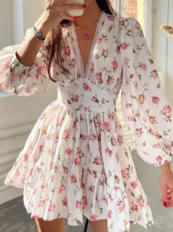 Robe d'été blanche élégante à manches longues et imprimé floral col en V idéale pour un rendez-vous galant.