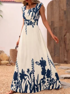 Robe d'été bohème bleu foncé à imprimé floral col carré sans manches fluide style bohème idéale pour la plage.