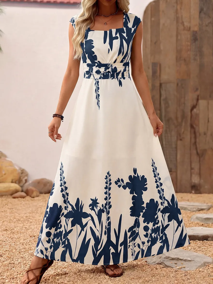 Robe d'été bohème bleu foncé à imprimé floral col carré sans manches fluide style bohème idéale pour la plage.