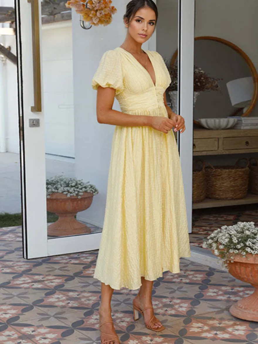 Robe d'été jaune beurre à manches bouffantes et décolleté plongeant robe longue décontractée d'été 2026