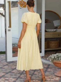 Robe d'été jaune beurre à manches bouffantes et décolleté plongeant robe longue décontractée d'été 2026