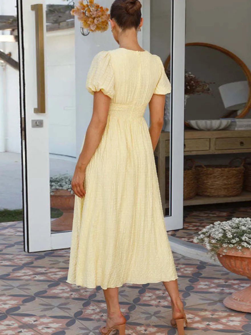 Robe d'été jaune beurre à manches bouffantes et décolleté plongeant robe longue décontractée d'été 2026