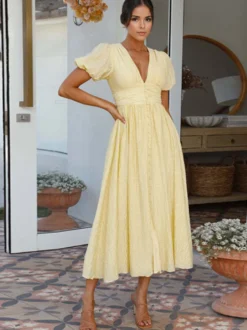 Robe d'été jaune beurre à manches bouffantes et décolleté plongeant robe longue décontractée d'été 2026