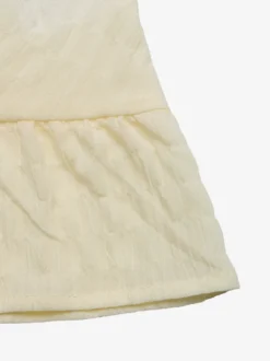 Robe d'été mini couleur abricot sans manches dos nu épaules dénudées idéale pour un rendez-vous amoureux.