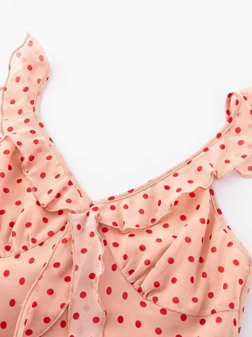 Robe imprimée rouge à fleurs sans manches col V et taille haute pour femme.
