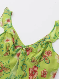 Robe imprimée rouge à fleurs sans manches col V et taille haute pour femme.