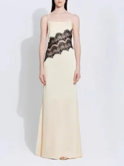Robe jaune maxi sans manches à bretelles et décolleté taille haute style sexy avec découpes.
