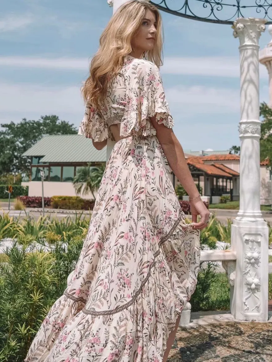 Robe longue bohème fleurie asymétrique pour femme - Rose crème découpes nœud sur le devant manches papillon - Été 2026