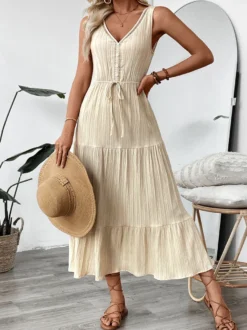 Robe longue bohème à volants pour femme - Couleur abricot texturée col en V sans manches taille nouée coupe trapèze - Collection été 2026