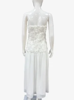 Robe longue à bretelles spaghetti fluides corsage à rosettes style bohème - Collection été 2026