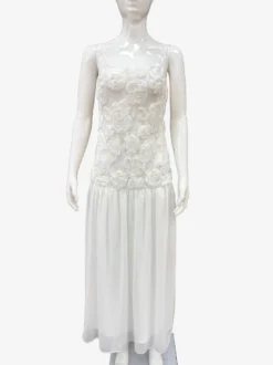 Robe longue à bretelles spaghetti fluides corsage à rosettes style bohème - Collection été 2026