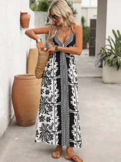 Robe longue dos nu à imprimé tropical noir et blanc pour femme col en V sans manches fluide idéale pour l'été et la plage