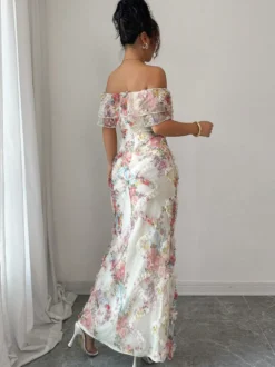 Robe longue dos nu à volants fermeture éclair imprimé floral épaules dénudées style romantique idéale pour un rendez-vous galant.