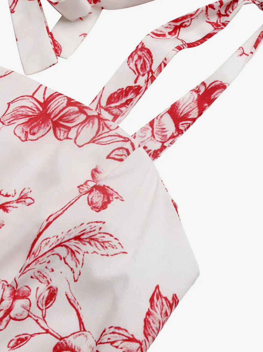 Robe longue d'été fluide à imprimé floral blanc et rouge pour femme col carré bretelles à nouer idéale pour la plage.