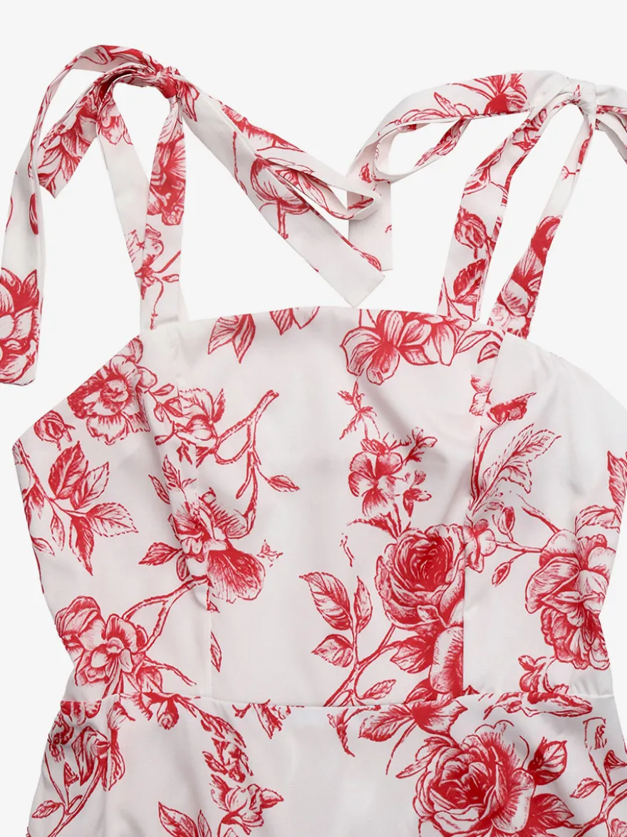 Robe longue d'été fluide à imprimé floral blanc et rouge pour femme col carré bretelles à nouer idéale pour la plage.