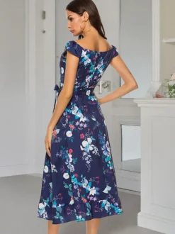 Robe longue d'été élégante à imprimé floral épaules dénudées sans manches et fermeture éclair.