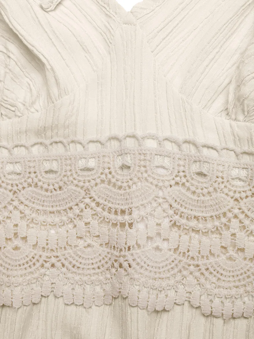 Robe longue fluide d'été pour femme couleur crème avec bretelles spaghetti et taille en dentelle blanche col en V.