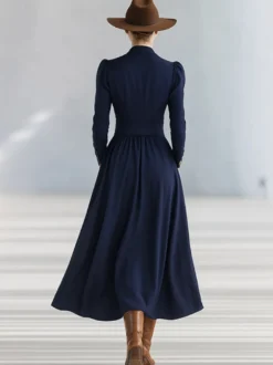 Robe longue maxi femme décolletée en V et taille froncée boutons dorés manches bouffantes coupe fluide trapèze