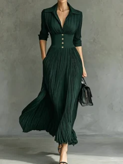Robe longue plissée à col V et manches 3/4 corset à la taille détails de boutons coupe fluide.