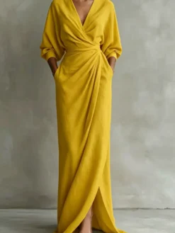 Robe longue portefeuille à col en V manches bouffantes ceinture à nouer fente et poches latérales