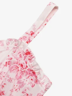 Robe longue rose chic à imprimé floral dos nu lacée à volants et sans manches ornée de fleurs et de décolleté épaules dénudées idéale pour un rendez-vous galant.