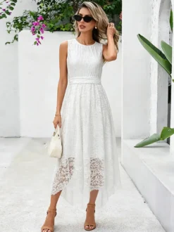 Robe longue sans manches à col rond et taille naturelle en dentelle élégante blanche