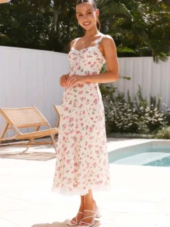 Robe longue sans manches à imprimé floral et bordure en dentelle pour l'été 2026