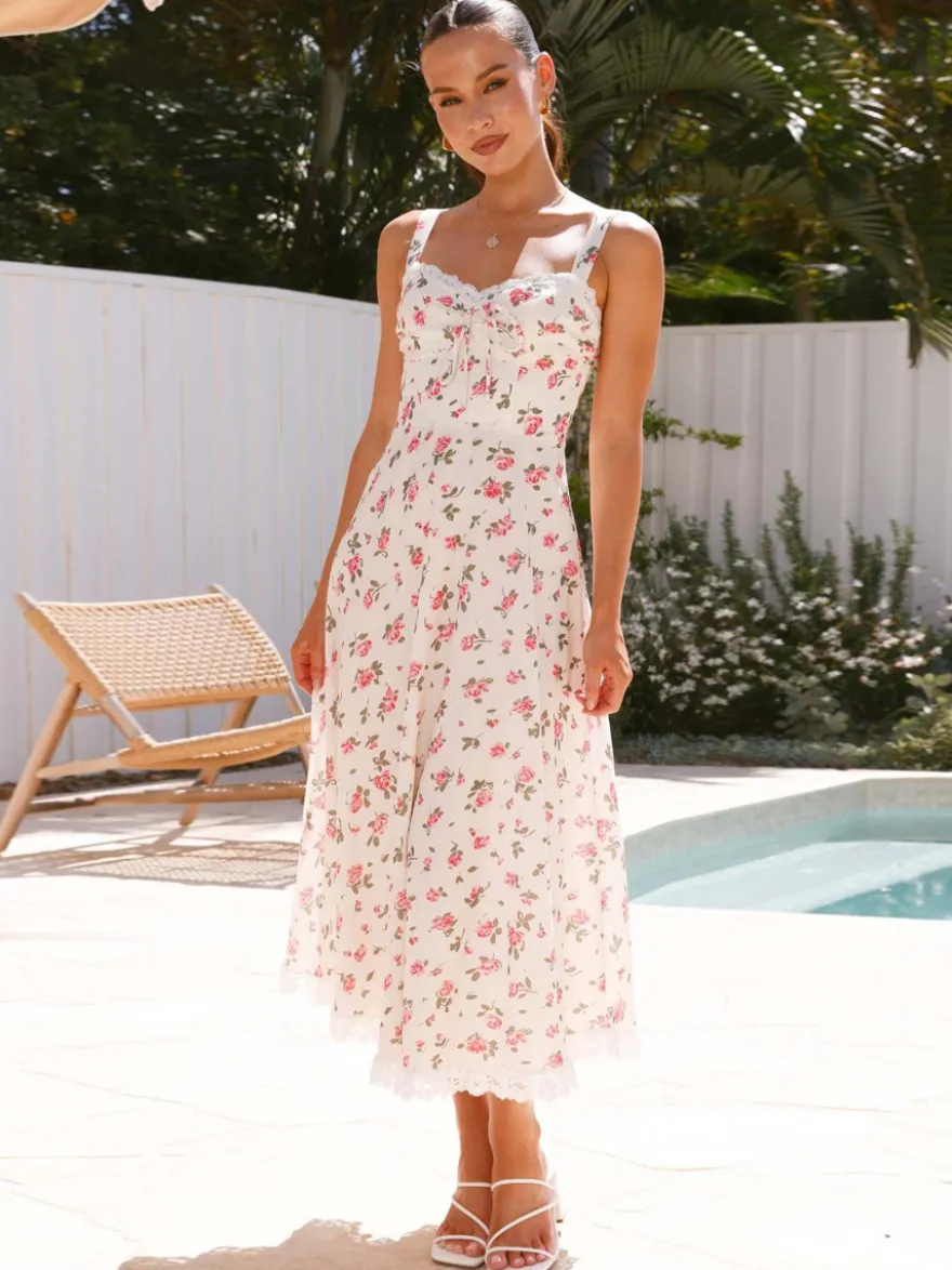 Robe longue sans manches à imprimé floral et bordure en dentelle pour l'été 2026