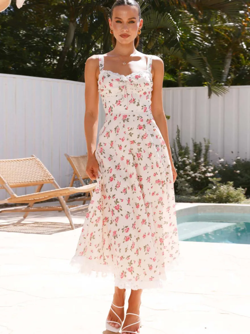 Robe longue sans manches à imprimé floral et bordure en dentelle pour l'été 2026