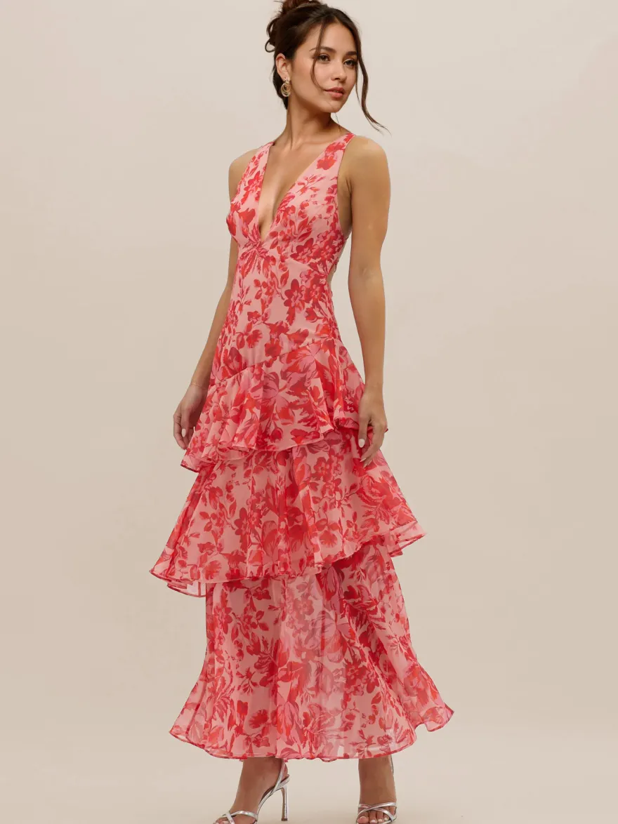 Robe longue à volants superposés et imprimé floral avec décolleté en V profond et dos ouvert 2026