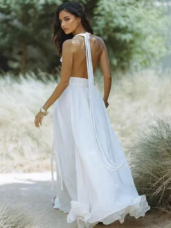 Robe maxi bohème dos nu pour femme - Robe longue sexy à décolleté plongeant en V col licou et ceinture à nouer - Collection été 2026