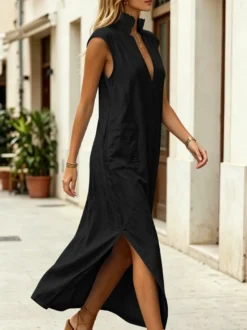 Robe maxi en lin sans manches à col montant et décolleté en V fente latérale coupe ample idéale pour les vacances.