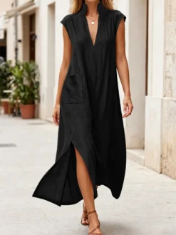 Robe maxi en lin sans manches à col montant et décolleté en V fente latérale coupe ample idéale pour les vacances.