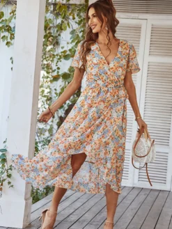 Robe midi portefeuille à imprimé floral pour femme - Robe courte à volants et coupe asymétrique - Tenue d'invitée pour un mariage d'été au jardin (collection 2026)