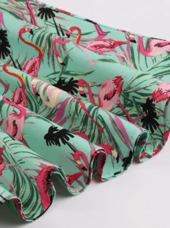Robe midi sans manches à imprimé flamant rose vintage col rond nœud dans le dos coupe trapèze verte