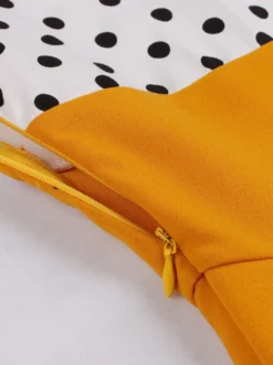 Robe midi vintage patchwork à pois col à revers manches courtes coupe trapèze jaune et noire