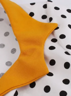 Robe midi vintage patchwork à pois col à revers manches courtes coupe trapèze jaune et noire
