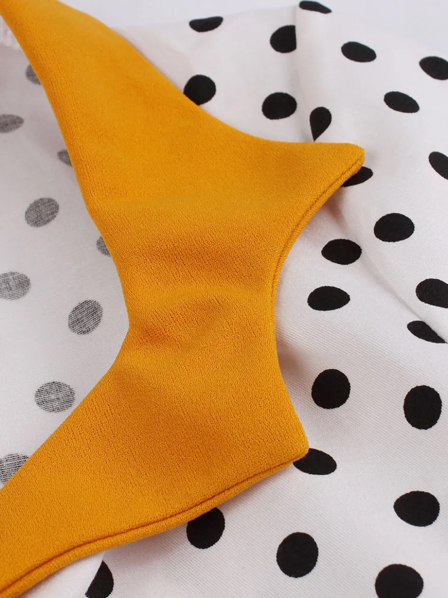 Robe midi vintage patchwork à pois col à revers manches courtes coupe trapèze jaune et noire