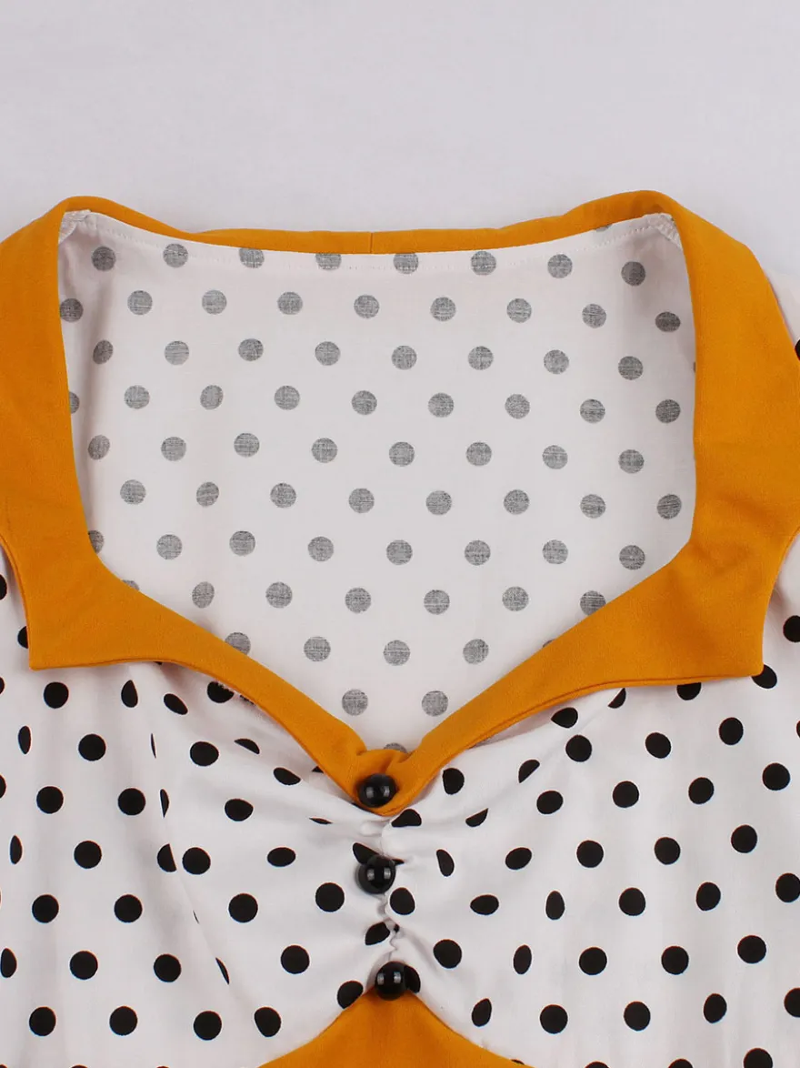 Robe midi vintage patchwork à pois col à revers manches courtes coupe trapèze jaune et noire