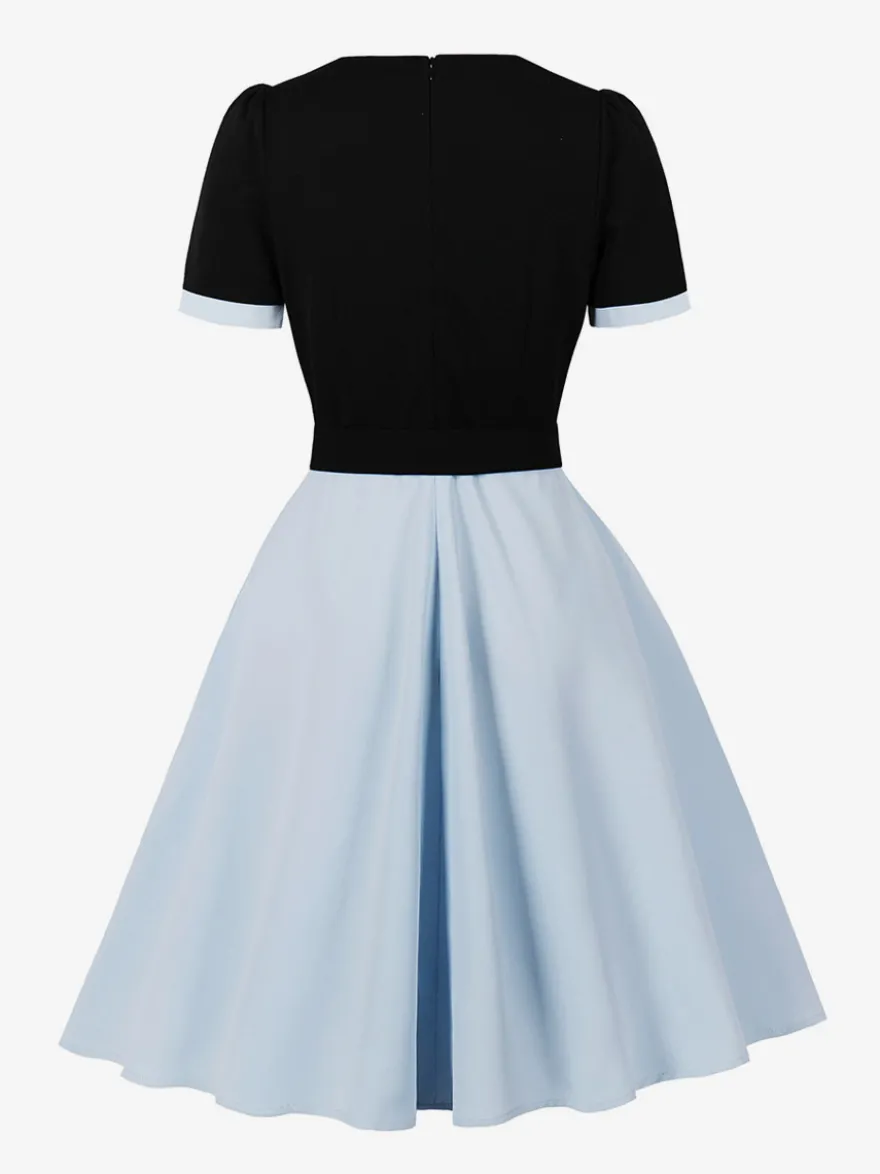 Robe midi vintage violette à col contrastant manches courtes et ceinture coupe trapèze