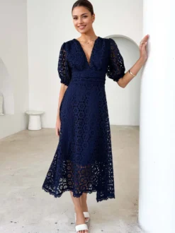 Robe mi-longue en dentelle à col en V et manches bouffantes pour femme (2026)