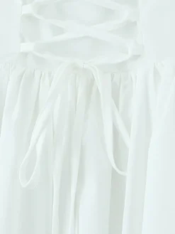Robe mini-corset jaune beurre sans manches avec bordure en dentelle et dos lacé 2026