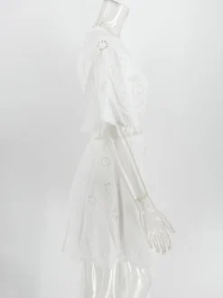 Robe mini dos nu à œillets blancs pour femme - Robe d'été bohème en coton coupe évasée et manches bouffantes - Idéale pour les vacances d'été à la plage 2026