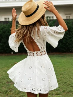 Robe mini dos nu à œillets blancs pour femme - Robe d'été bohème en coton coupe évasée et manches bouffantes - Idéale pour les vacances d'été à la plage 2026
