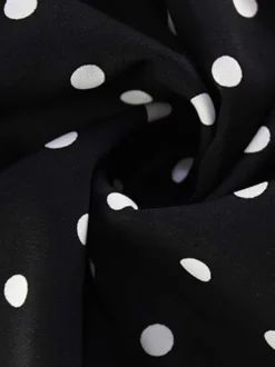 Robe mini dos nu à pois vintage pour femme - Robe d'été noire rétro à découpe en forme de goutte et col croisé - Idéale pour une soirée entre filles en 2026
