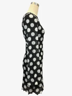 Robe mini moulante à pois manches longues et dos nu collection 2026